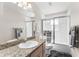 Bathroom boasts a shower/tub combo, granite countertop, and double sinks at 174 Juniper Trl, Ocala, FL 34480