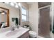 Bathroom features a shower, toilet and vanity at 174 Juniper Trl, Ocala, FL 34480