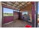 Barn stall with hay and storage at 174 Juniper Trl, Ocala, FL 34480