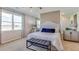 Relaxing bedroom with large windows and plush bedding at 9342 Sw 60Th Court Rd, Ocala, FL 34476