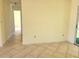 Living room with tile floors and access to patio at 8424 Sw 107Th Pl, Ocala, FL 34481