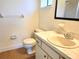 Clean bathroom with toilet, sink, and vanity at 8424 Sw 107Th Pl, Ocala, FL 34481