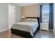 Cozy bedroom with a double bed and en-suite bathroom at 7694 Graben St, Kissimmee, FL 34747