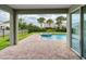 Private backyard oasis with a refreshing pool and spa at 7694 Graben St, Kissimmee, FL 34747