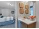 Vanity with sink and mirror, plus additional storage at 7694 Graben St, Kissimmee, FL 34747