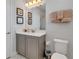 Clean bathroom with vanity, toilet, and shower at 7694 Graben St, Kissimmee, FL 34747