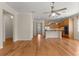 Spacious living room with hardwood floors and ceiling fan at 9823 Sw 95Th Loop, Ocala, FL 34481
