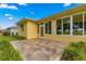 Spacious stone patio adjacent to the home at 9823 Sw 95Th Loop, Ocala, FL 34481