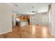 Spacious living room with hardwood floors and ceiling fan at 9823 Sw 95Th Loop, Ocala, FL 34481