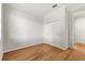 Bedroom with hardwood floors, double door closet at 9823 Sw 95Th Loop, Ocala, FL 34481