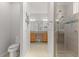 View of bathroom with toilet and shower at 9823 Sw 95Th Loop, Ocala, FL 34481