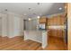 Modern kitchen with granite island and stainless steel appliances at 9823 Sw 95Th Loop, Ocala, FL 34481