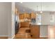 Modern kitchen with granite island and stainless steel appliances at 9823 Sw 95Th Loop, Ocala, FL 34481