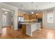 Modern kitchen with granite island and stainless steel appliances at 9823 Sw 95Th Loop, Ocala, FL 34481