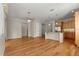 Spacious living room with hardwood floors and ceiling fan at 9823 Sw 95Th Loop, Ocala, FL 34481