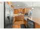 Modern kitchen with granite countertops and stainless steel appliances at 9823 Sw 95Th Loop, Ocala, FL 34481