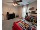 Cozy bedroom with a dresser and a bed at 1965 County Road 243C, Wildwood, FL 34785