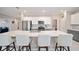 Modern kitchen with a large island and stainless steel appliances at 8924 Sw 76Th Ln, Ocala, FL 34481