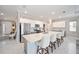 Modern kitchen with a large island and stainless steel appliances at 8924 Sw 76Th Ln, Ocala, FL 34481
