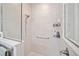 Walk-in shower with grab bars and neutral tile at 8924 Sw 76Th Ln, Ocala, FL 34481