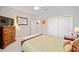 Spacious bedroom with a queen bed, large closet, and TV at 8924 Sw 76Th Ln, Ocala, FL 34481