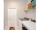 Convenient laundry room with washer, dryer, and extra storage at 8924 Sw 76Th Ln, Ocala, FL 34481