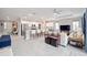 Modern kitchen boasts stainless steel appliances and an expansive island with seating at 8924 Sw 76Th Ln, Ocala, FL 34481