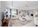 Spacious living room with comfortable seating and large windows at 8924 Sw 76Th Ln, Ocala, FL 34481