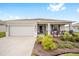 Single-story home with attached garage and landscaped front yard at 8924 Sw 76Th Ln, Ocala, FL 34481