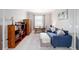 Bright home office featuring a sofa, bookcase, and desk at 8924 Sw 76Th Ln, Ocala, FL 34481