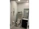 Clean bathroom, granite vanity, and updated fixtures at 8314 Sw 59Th Ter, Ocala, FL 34476