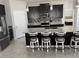 Island kitchen with granite countertops and stainless steel appliances at 8314 Sw 59Th Ter, Ocala, FL 34476