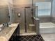 Spa-like bathroom with double sinks, shower, and tub at 8314 Sw 59Th Ter, Ocala, FL 34476
