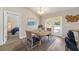 Charming dining area with rustic table and access to backyard at 17 Locust Radial Crse, Ocala, FL 34472