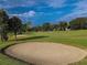 Sand trap on a manicured golf course at 9240 Se 128Th Ln, Summerfield, FL 34491