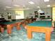 Recreation room with multiple billiard tables at 9240 Se 128Th Ln, Summerfield, FL 34491
