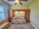 Versatile bonus room with built-in sofa and cabinets at 9240 Se 128Th Ln, Summerfield, FL 34491