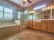 Spa-like bathroom with a large walk-in shower and double vanity at 9240 Se 128Th Ln, Summerfield, FL 34491