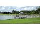 Gazebo and dock overlooking lake at 9240 Se 128Th Ln, Summerfield, FL 34491