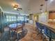 Gathering room features a fireplace and plenty of natural light at 9240 Se 128Th Ln, Summerfield, FL 34491