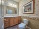 Charming bathroom with sunflower wallpaper and a single vanity at 9240 Se 128Th Ln, Summerfield, FL 34491