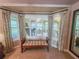 Main bedroom with bay window and window seat at 9240 Se 128Th Ln, Summerfield, FL 34491
