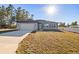 Newly constructed home with attached garage and driveway at 4294 Sw 108Th Lane Rd, Ocala, FL 34476