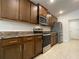 Kitchen with stainless steel appliances and wood cabinets at 4426 Nw 2Nd Ct, Ocala, FL 34475