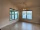 Bright dining area with tile flooring and large windows at 4426 Nw 2Nd Ct, Ocala, FL 34475
