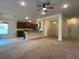 Open concept kitchen with stainless steel appliances and an island at 4426 Nw 2Nd Ct, Ocala, FL 34475
