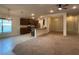 Open concept kitchen with island, stainless steel appliances, and dark wood cabinets at 4426 Nw 2Nd Ct, Ocala, FL 34475