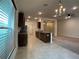 Modern kitchen with wood cabinets and granite countertops at 4426 Nw 2Nd Ct, Ocala, FL 34475