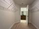 Spacious walk-in closet with ample shelving at 4426 Nw 2Nd Ct, Ocala, FL 34475