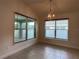 Bright dining area with tile flooring and large windows at 4426 Nw 2Nd Ct, Ocala, FL 34475
